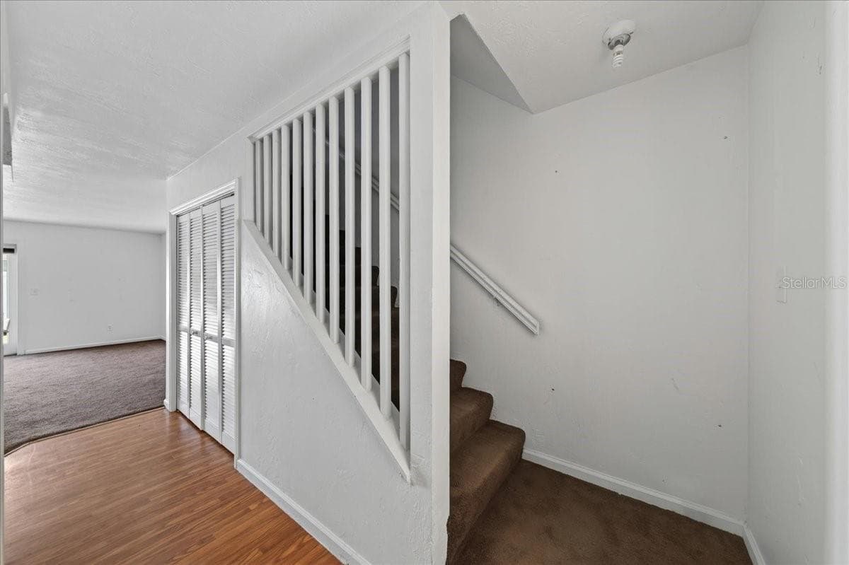 Unit 845 Foyer and view of stairs - 841 E 14TH AVE, NEW SMYRNA BEACH