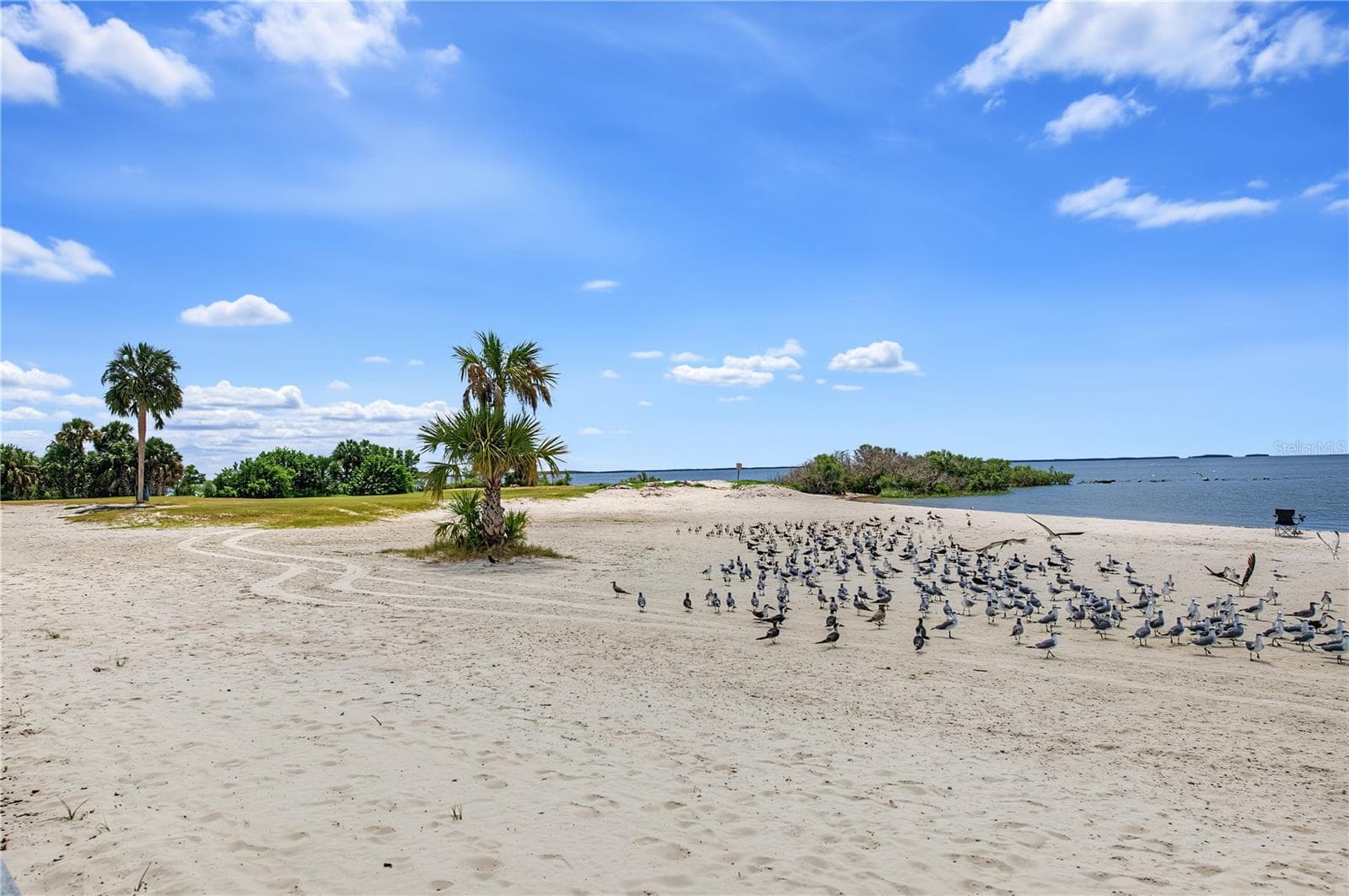 Enjoy the sandy shoreline and waterfront scenery at nearby Fort Island Gulf Beach. - 10933 W FORT ISLAND TRL, CRYSTAL RIVER