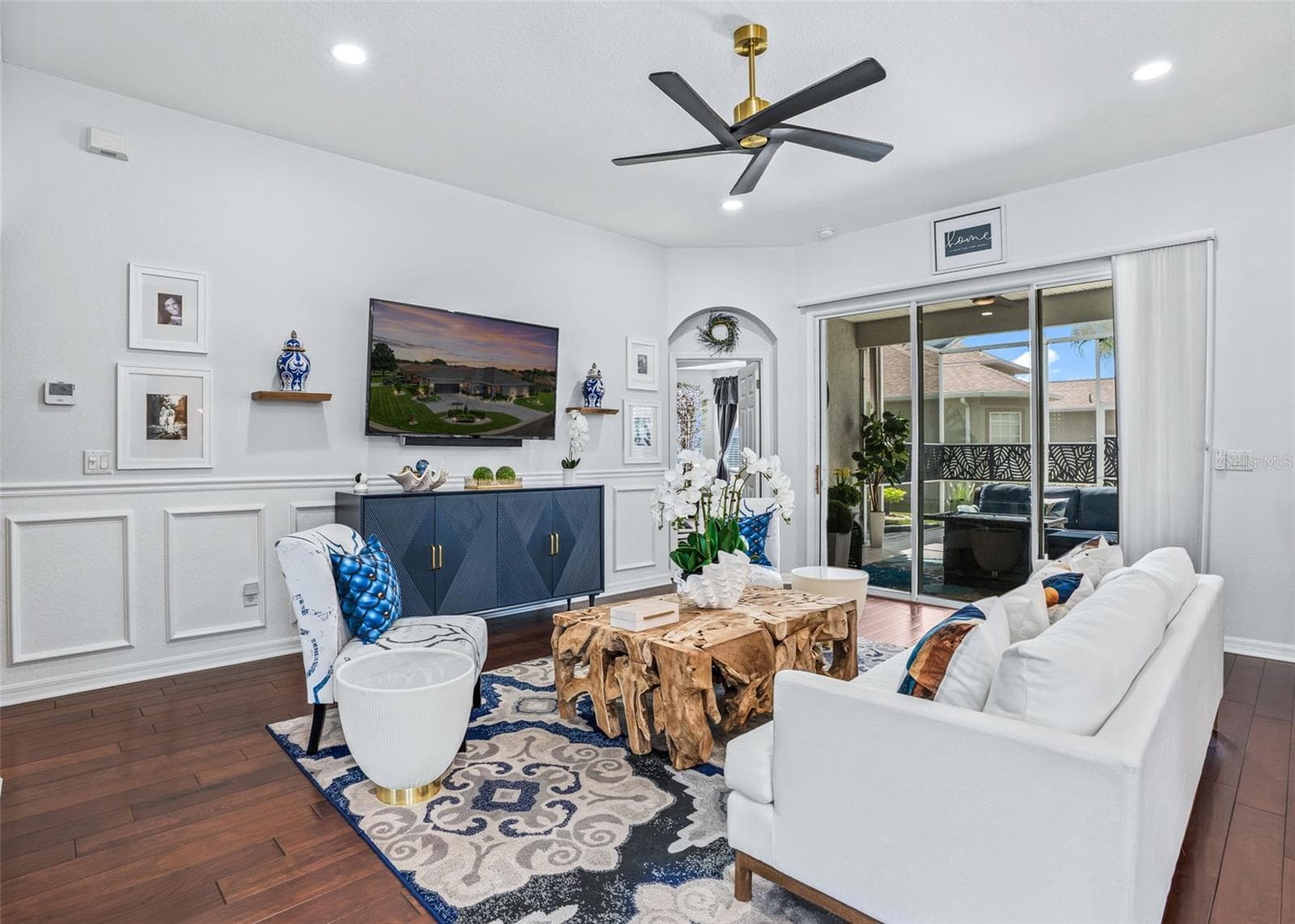 Living area w/Stackable sliders to Lanai - 12056 SE 178TH ST, SUMMERFIELD