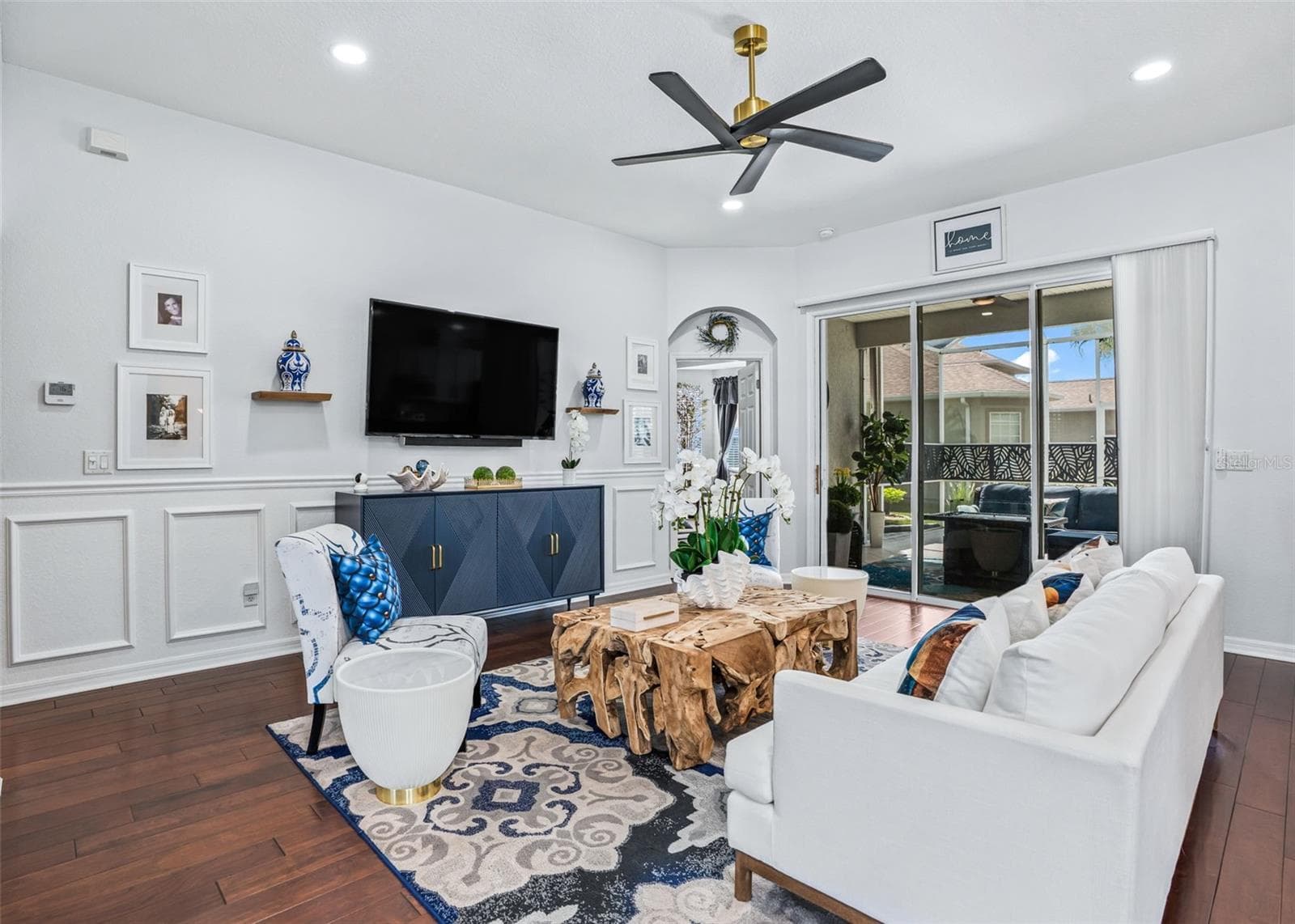 Living area w/Designer ceiling fan - 12056 SE 178TH ST, SUMMERFIELD