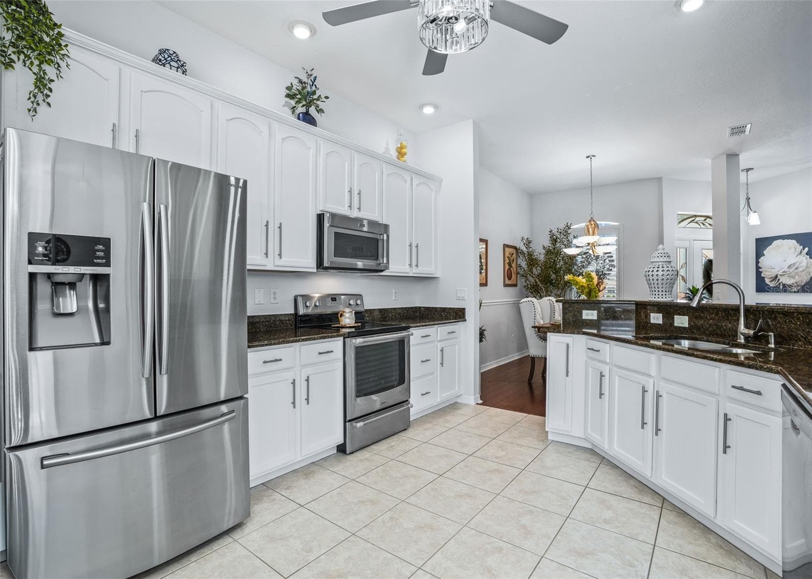 Plenty of White wood cabinetry - 12056 SE 178TH ST, SUMMERFIELD