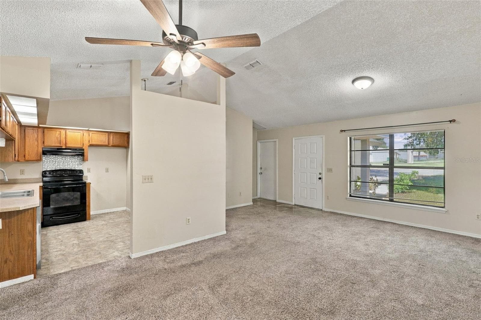 Dinning Room to Kitchen - 1249 HOWLAND BLVD, DELTONA