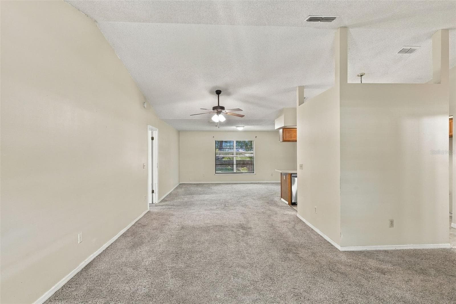 Living Room to Dinning Room and Kitchen - 1249 HOWLAND BLVD, DELTONA