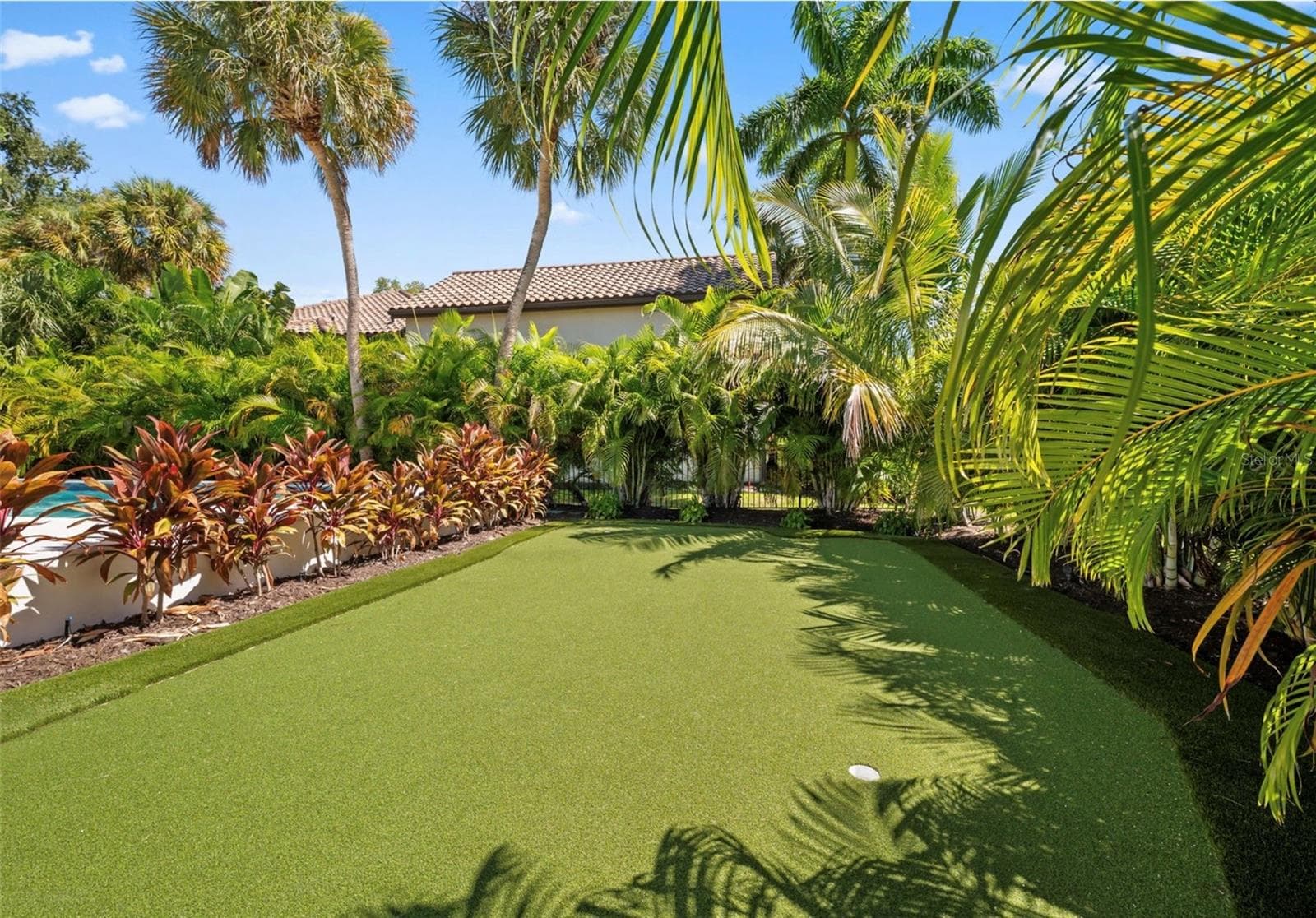 Get your practice shots in on this multi level putting green! - 3360 BAYOU SOUND, LONGBOAT KEY
