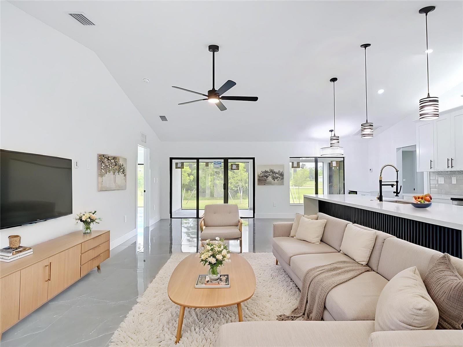 Virtually staged living/family room - 3613 NW 47TH LN, CAPE CORAL
