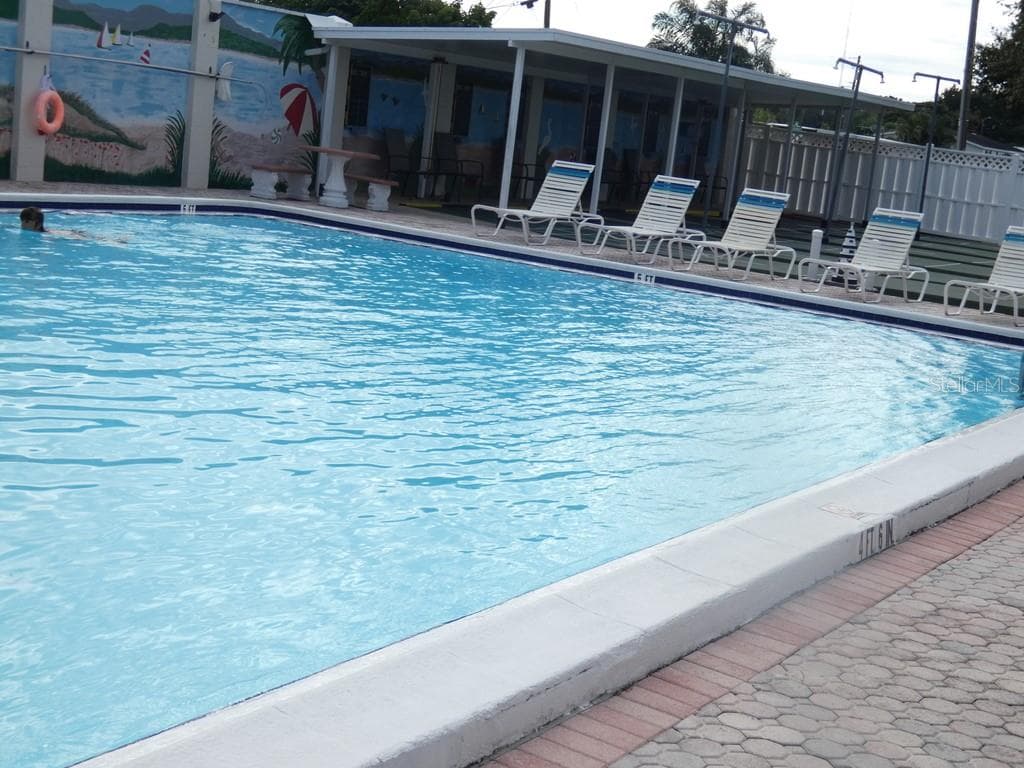 Heated Pool at The Club House - 4322 TAHITIAN GARDENS CIR #B, HOLIDAY