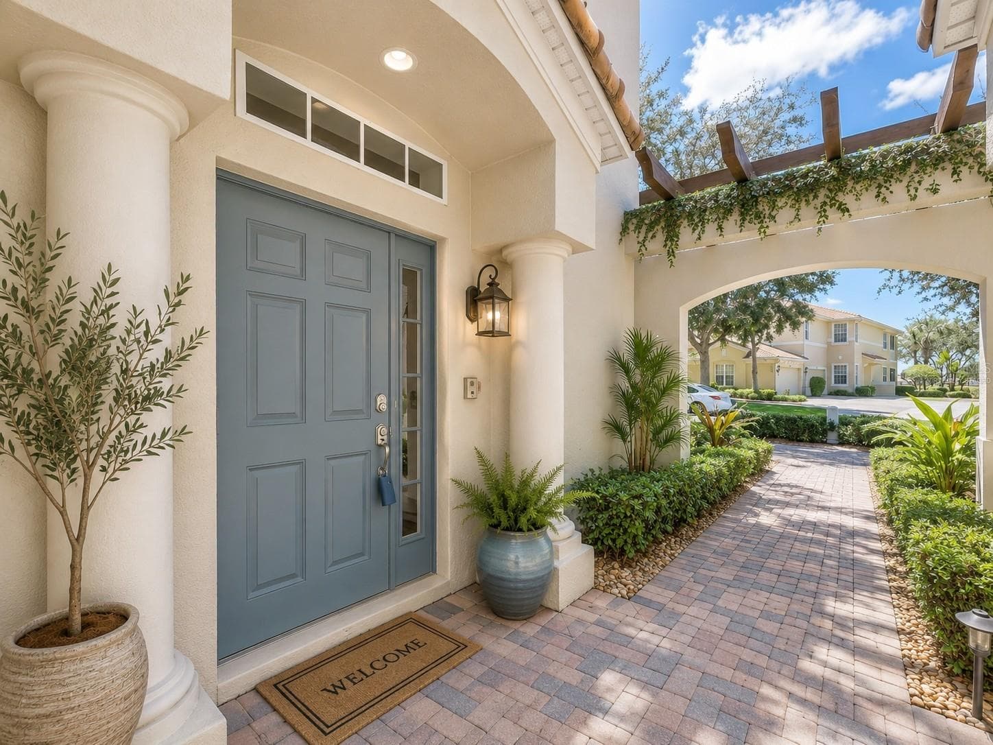 Front Door Entrance - virtually staged - 1338 EMERALD DUNES DR #35, SUN CITY CENTER
