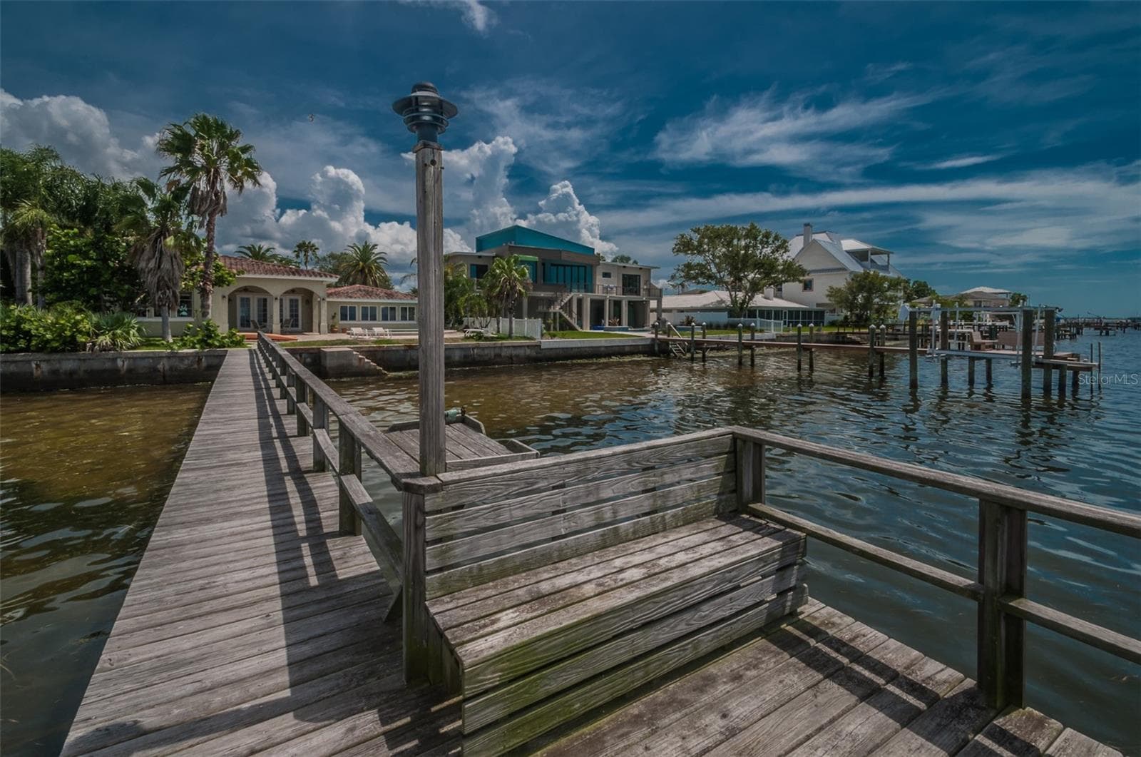 This charming coastal community is surrounded by the waters of St. Joseph Sound, with marinas, docks, and beautiful waterfront scenery woven throughout the neighborhood. - 201 SOUTH ST, PALM HARBOR