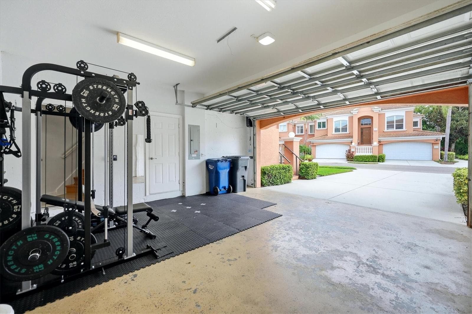 weight set in garage conveys - 5458 46TH CT W, BRADENTON