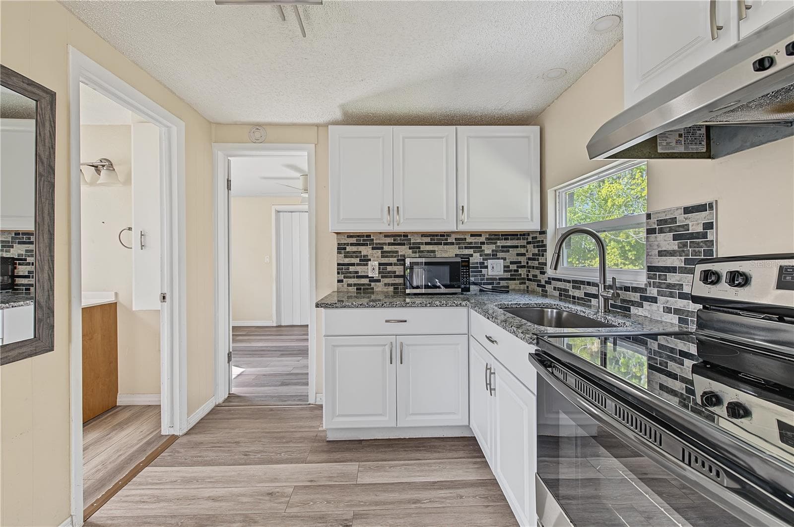 Kitchen in Second Floor Unit - Unit 2 - 5117 Mallett Drive - 5117 MALLETT DR, PORT RICHEY
