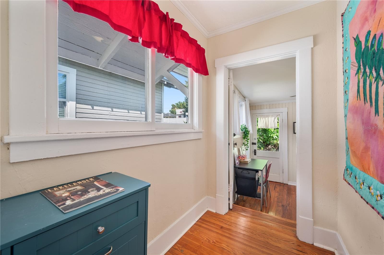 Hallway off the kitchen heading to the 2nd bedroom and exterior back door - 412 E PALM DR, LAKELAND