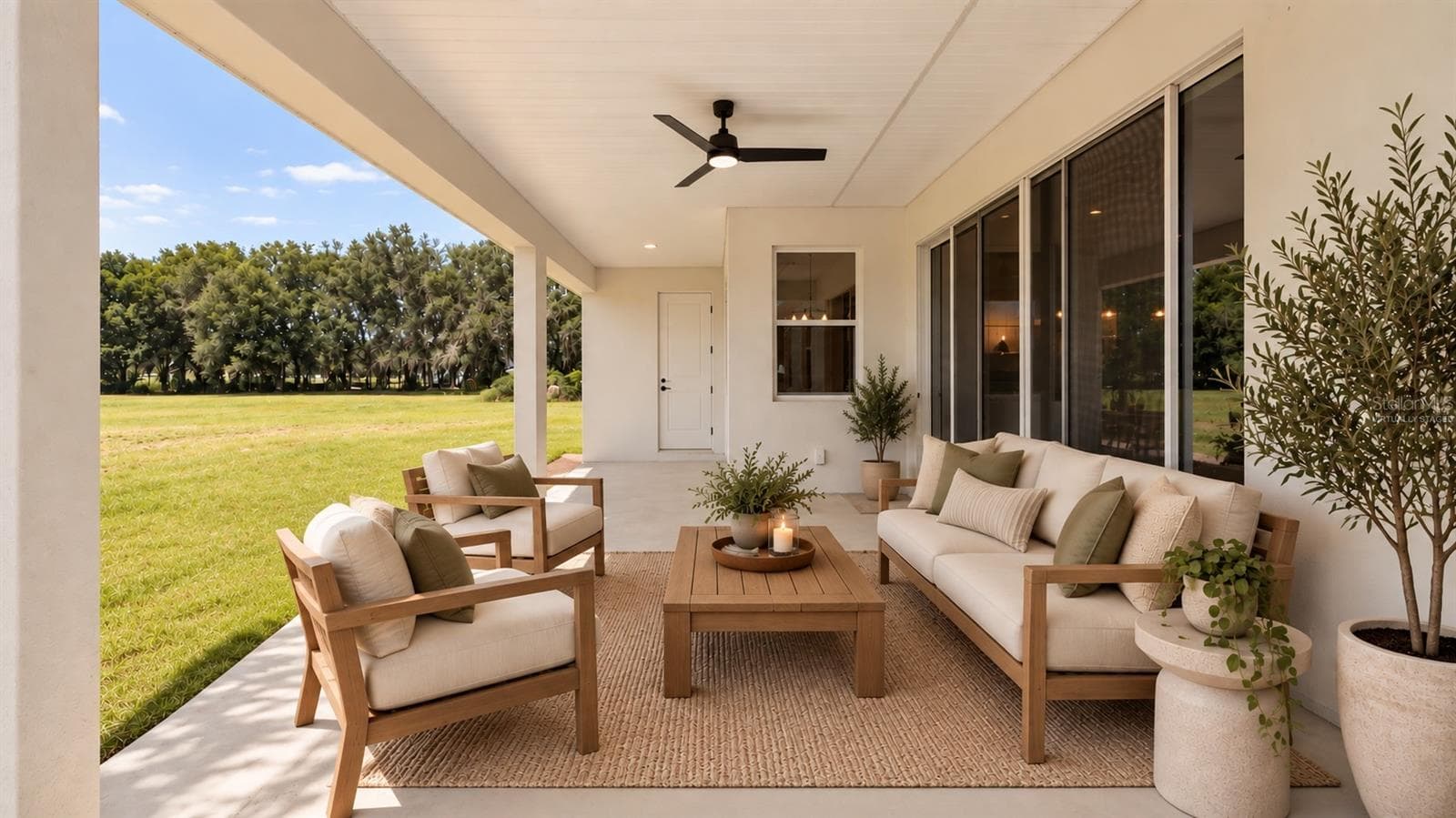back porch virtually staged - 10720 PHILIPS LANDING CT, WEBSTER