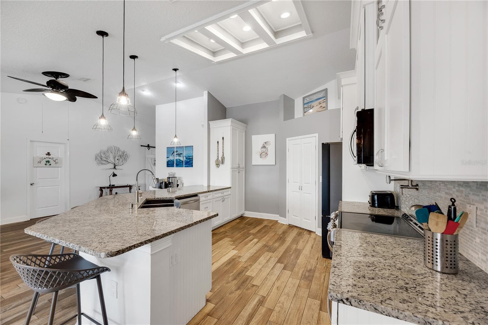 There is a double cabinet storage pantry for all of your kitchen essentials. - 743 KINGSTON CT, APOLLO BEACH