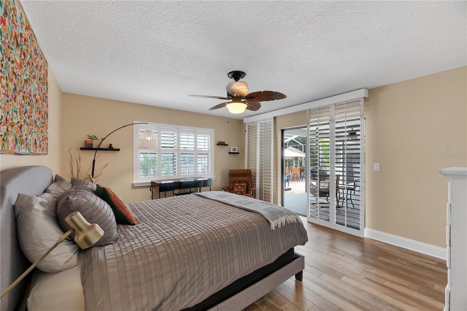 This secondary bedroom is located on the back of the home with private access to the lania. - 743 KINGSTON CT, APOLLO BEACH