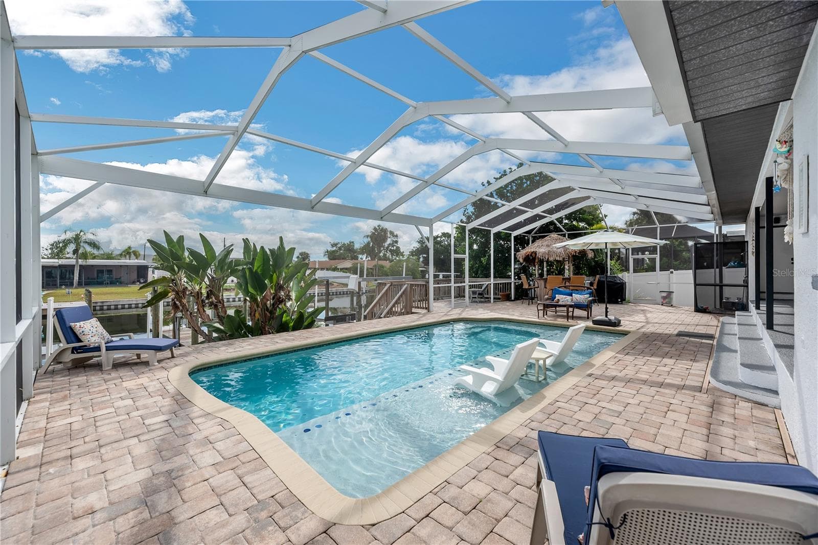 There is plenty of room for lounge chairs all around this pool. - 743 KINGSTON CT, APOLLO BEACH