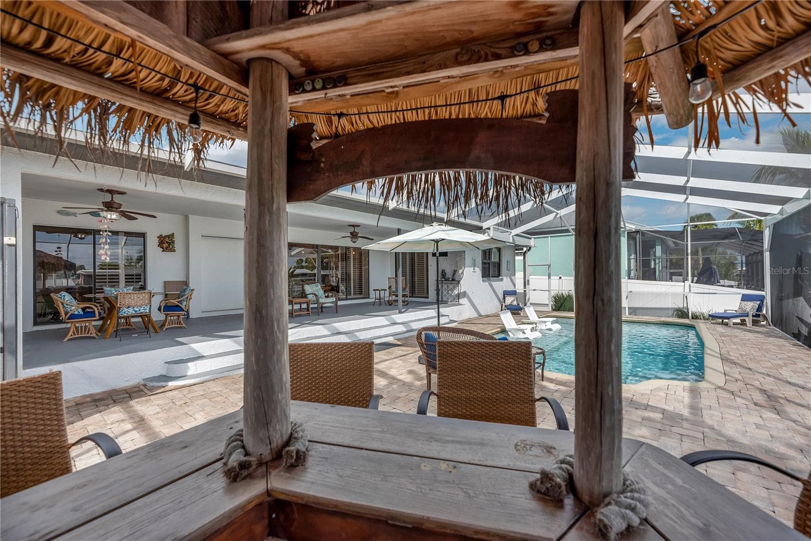 Tike bar with storage and electric added in 2022. - 743 KINGSTON CT, APOLLO BEACH