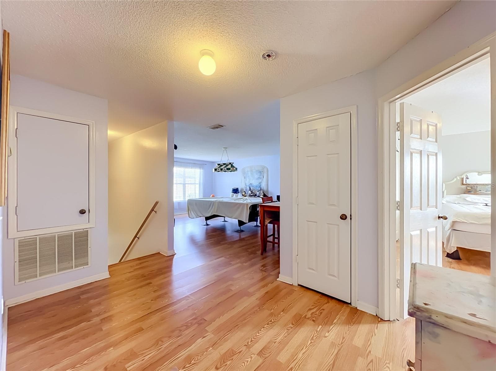 Wood laminate floors at landing on 2nd floor - 12900 LOS ALAMITOS CT, ORLANDO