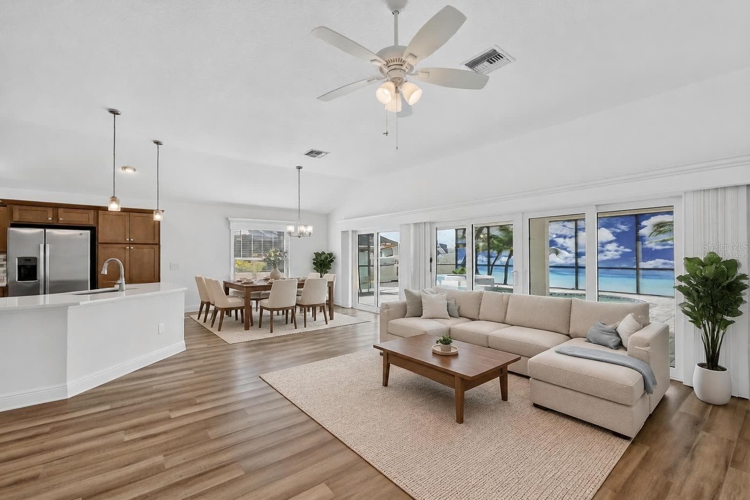 Living, Dining, and Kitchen-Virtually Staged - 6996 DWIGHT DR, THE VILLAGES