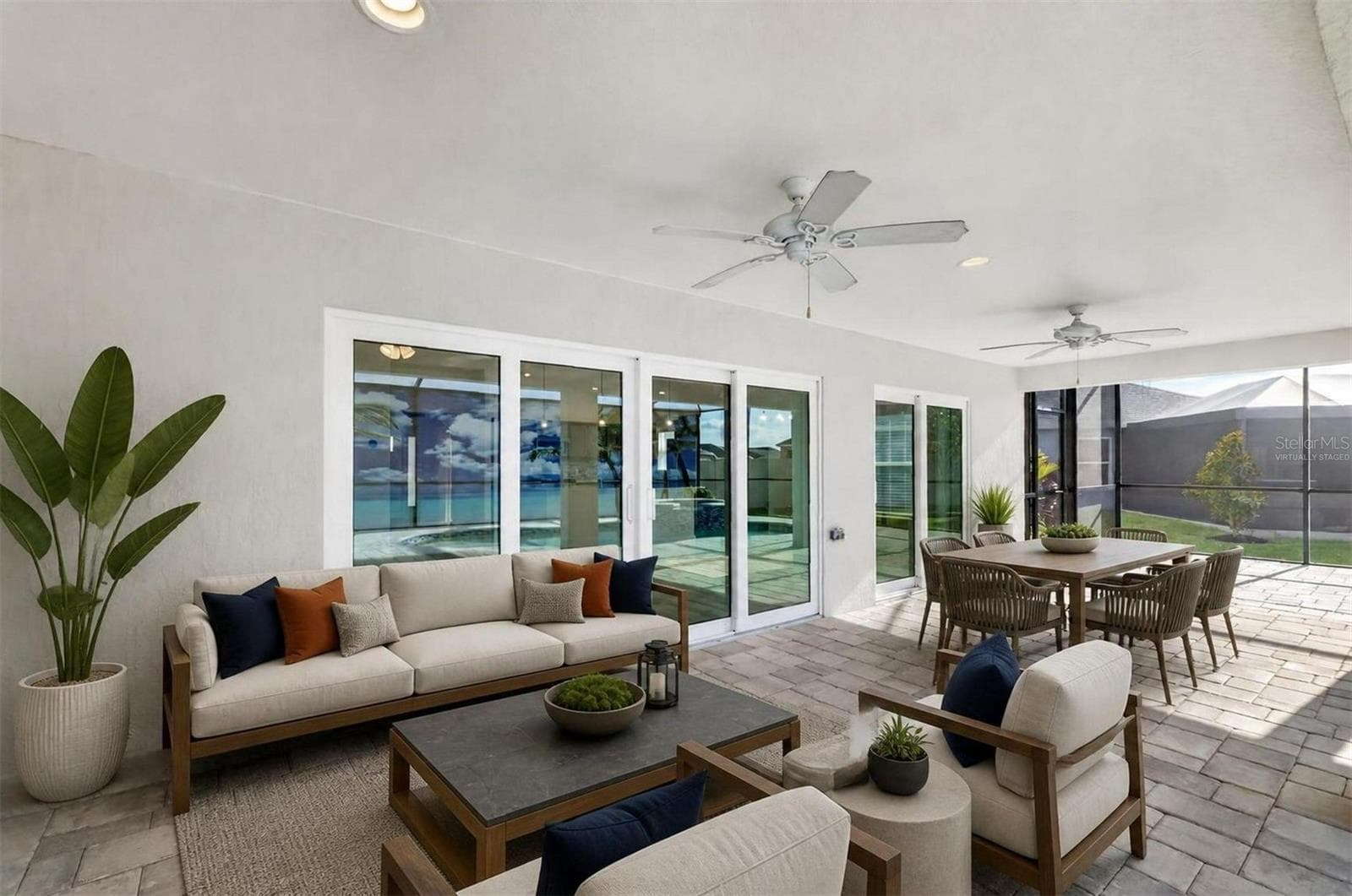 Paver Lanai with Extended Birdcage- Virtually Staged - 6996 DWIGHT DR, THE VILLAGES