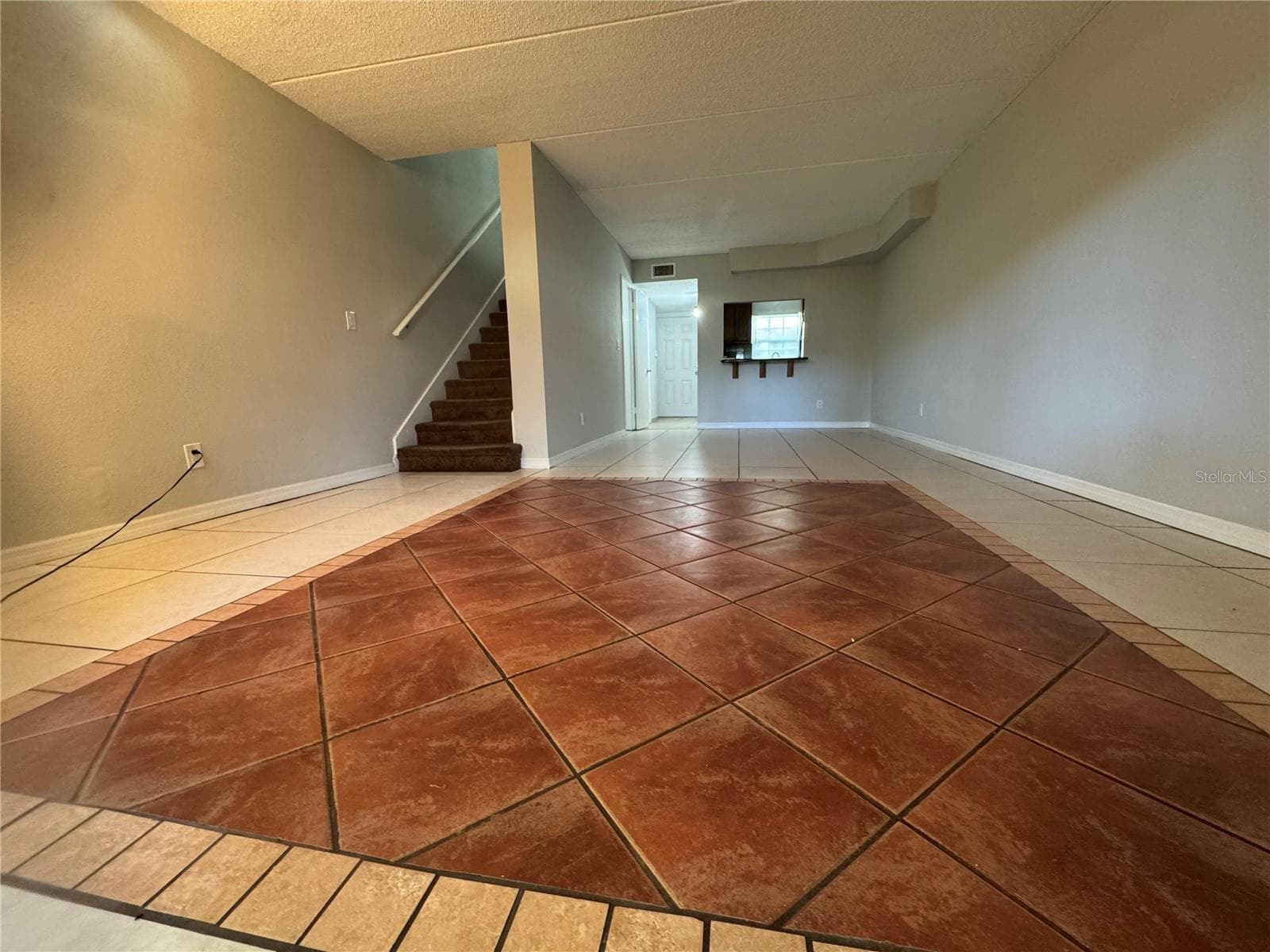 FROM REAR PATIO SLIDERS TO FRONT THRU LOUNGING ROOM/ DINING & TO FOYER & FT DOOR - 2884 SOMERSET PARK DR #2907, TAMPA