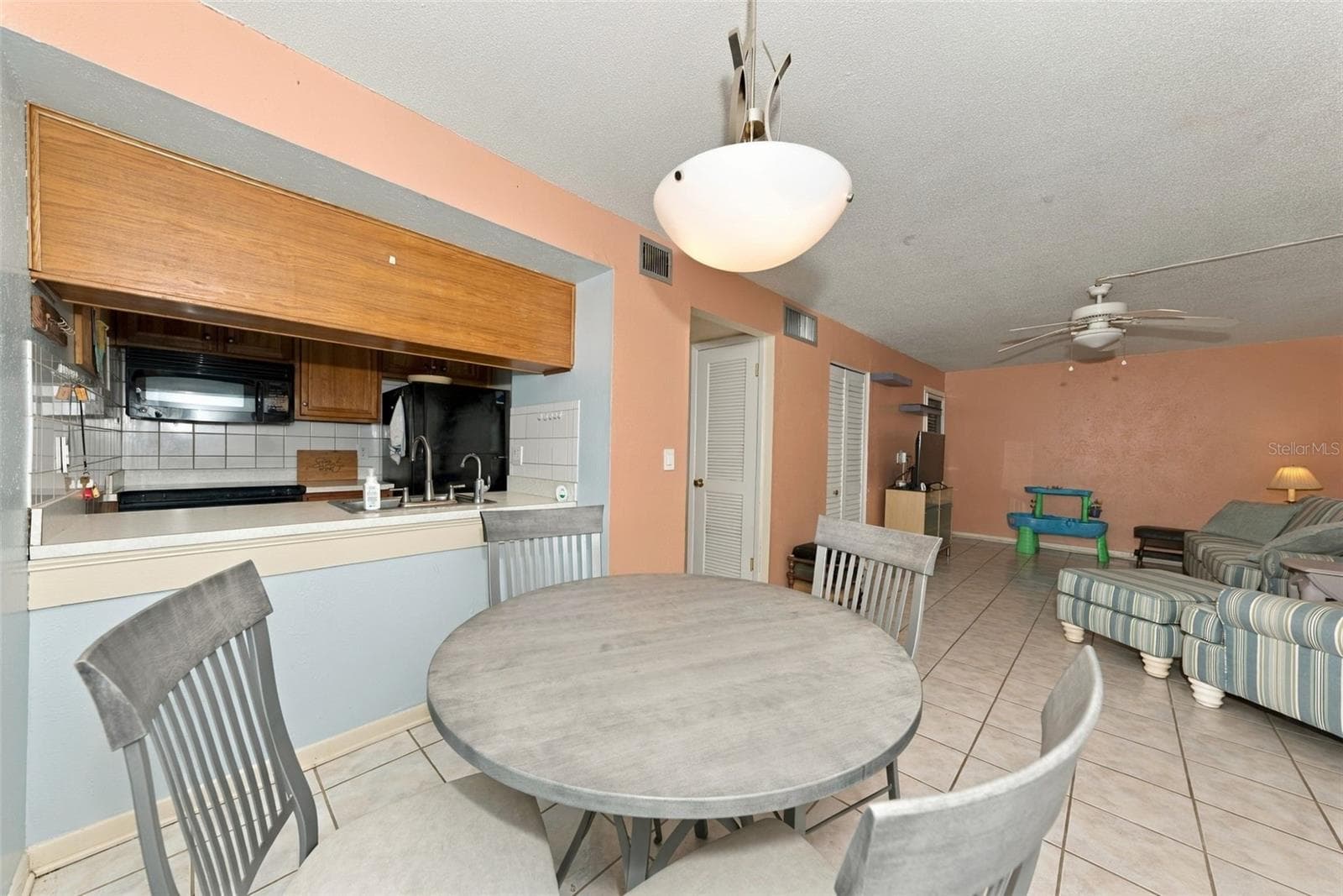 Dining room living room combo - 1799 N HIGHLAND AVE #159, CLEARWATER