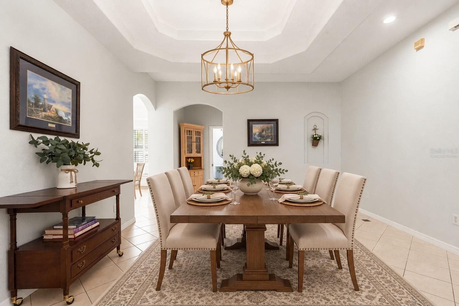 Virtually staged dining room - 8380 GOLDEN PRAIRIE DR, TAMPA