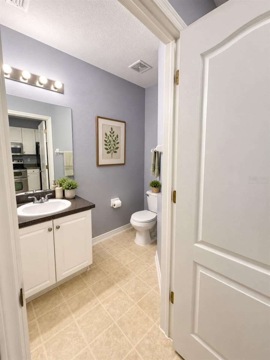 Virtually Staged - Downstairs Half Bath - 12307 FOXMOOR PEAK DR, RIVERVIEW