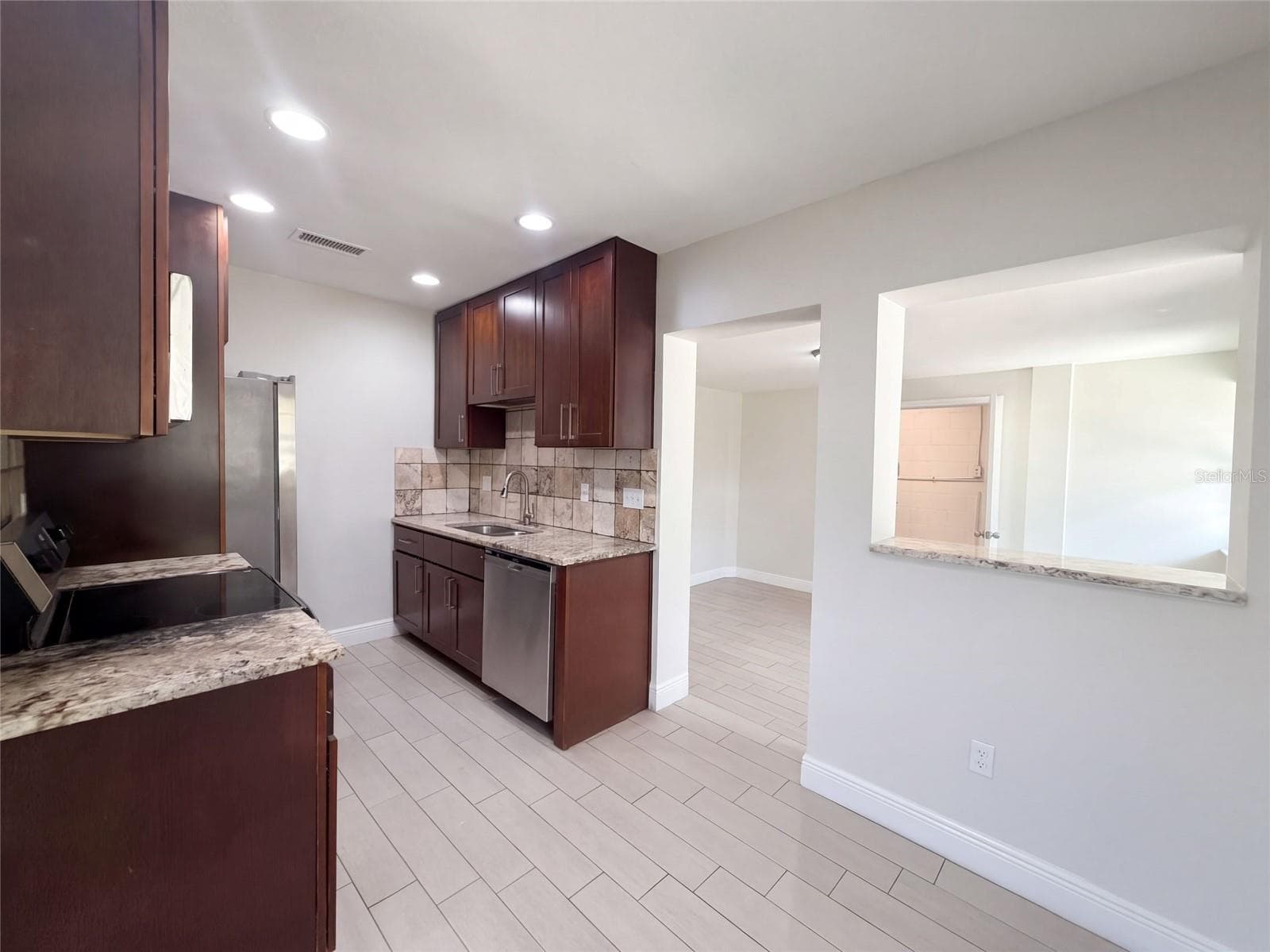 Single Family Residence at 1610 STEVENSONS DR, CLEARWATER, photo 2 of 20