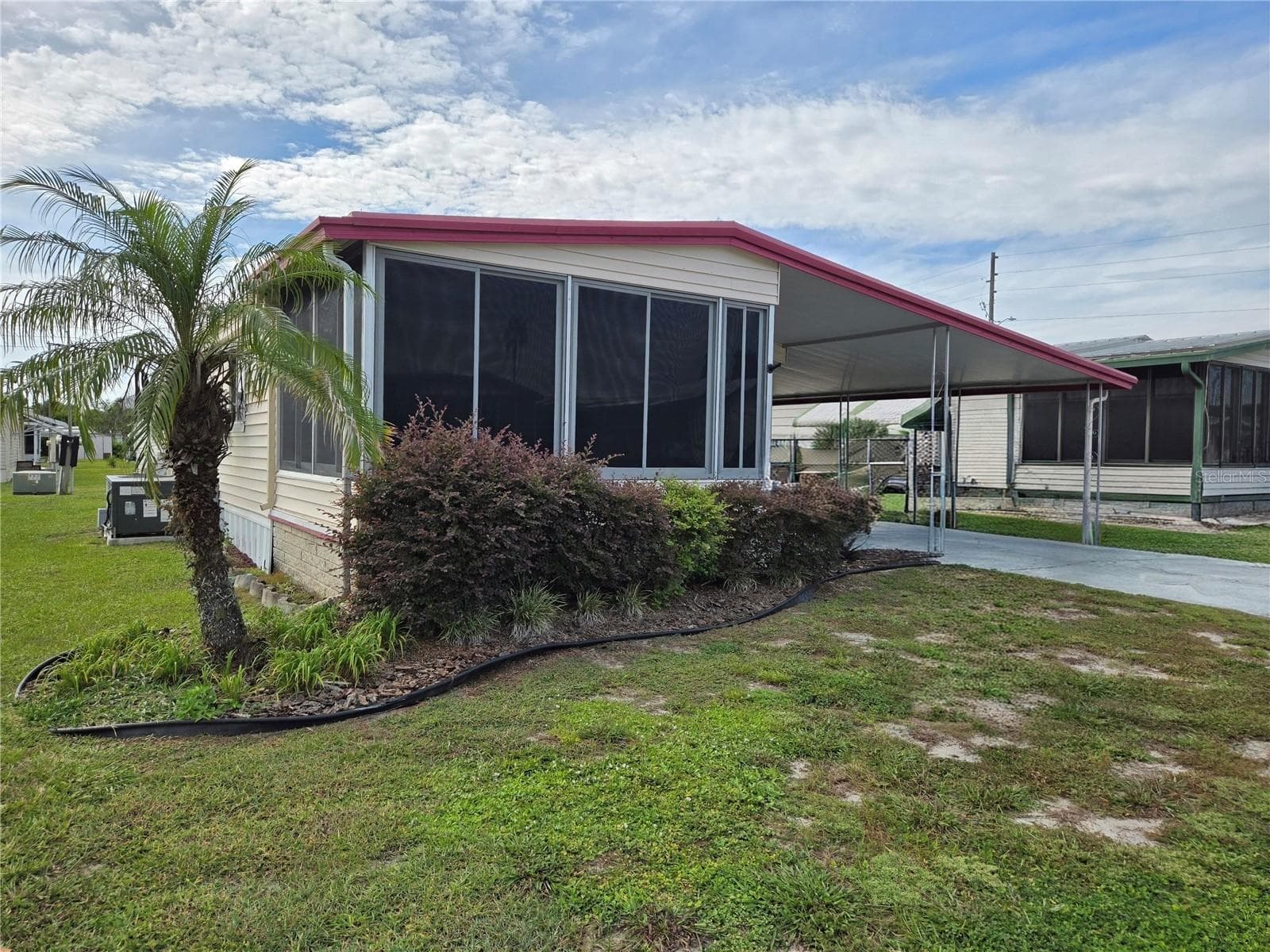 Manufactured Home at 6245 QUALITY LN, ZEPHYRHILLS, photo 3 of 52