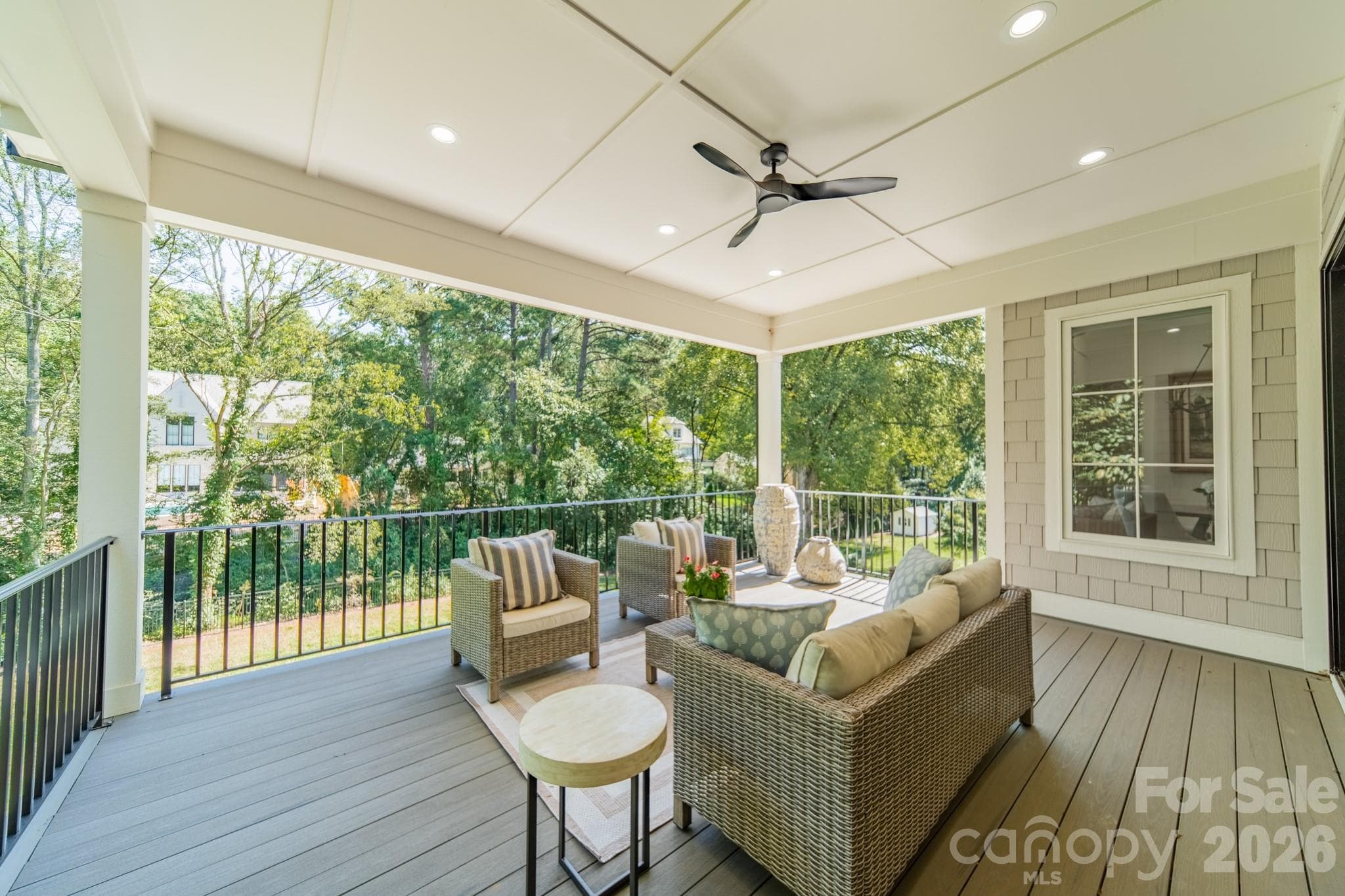 Serene covered deck overlooking large backyard - 3319 Gresham Place, Charlotte