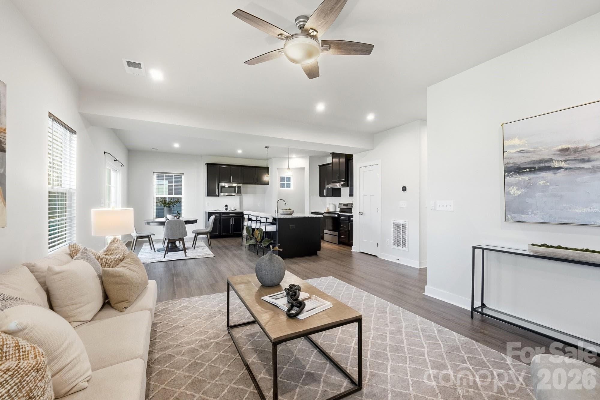 Spacious, open-concept view of the kitchen looking from the living room area. - 1857 Giana Lane, Monroe