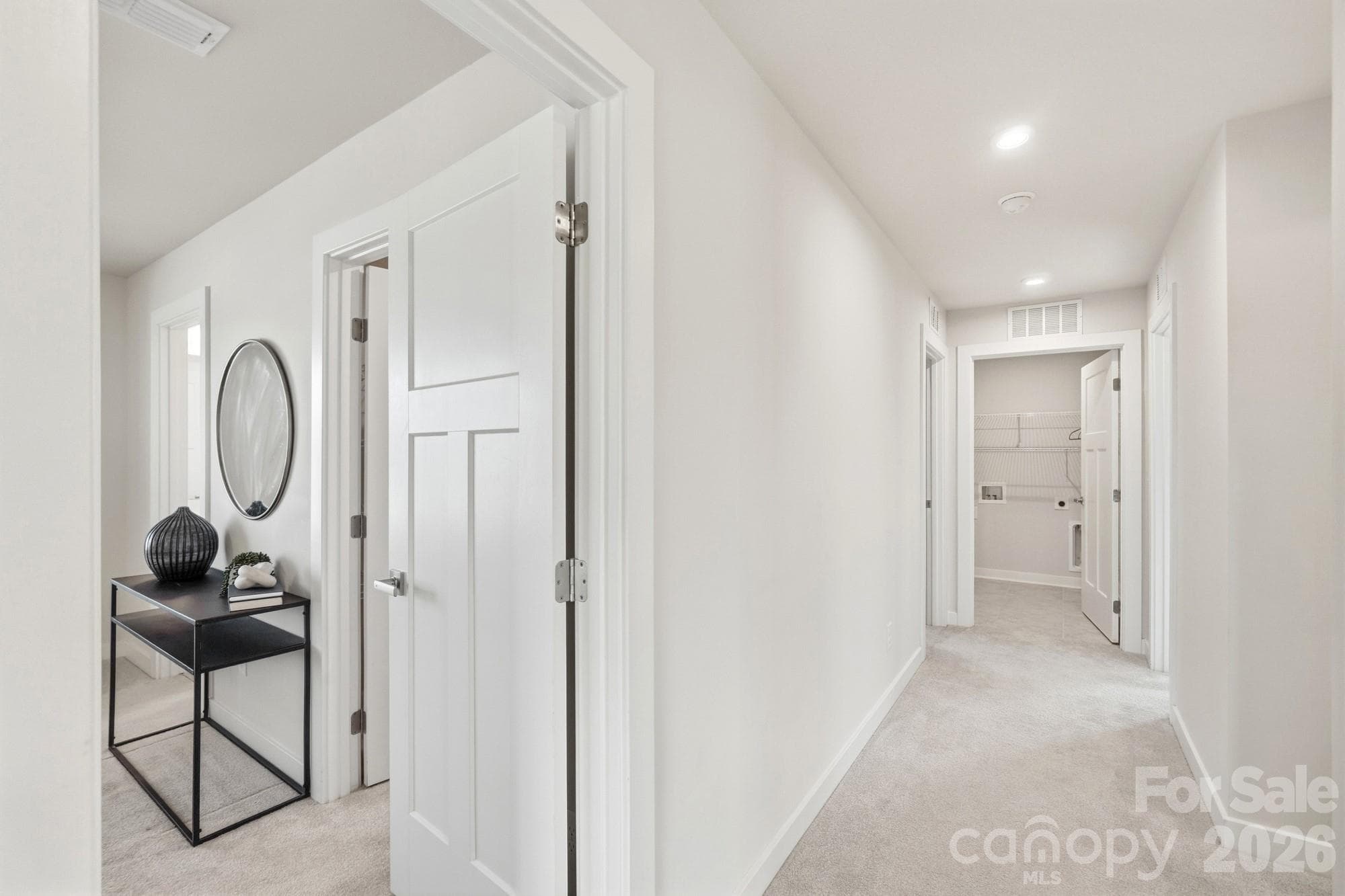 Second-floor hallway entrance and walkway view. - 1857 Giana Lane, Monroe