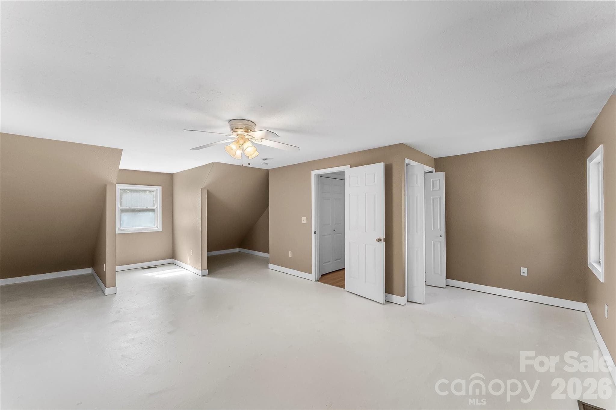 Upstairs primary bedroom (buyer to choose/install flooring) - 221 Old US 70 Highway E, Black Mountain
