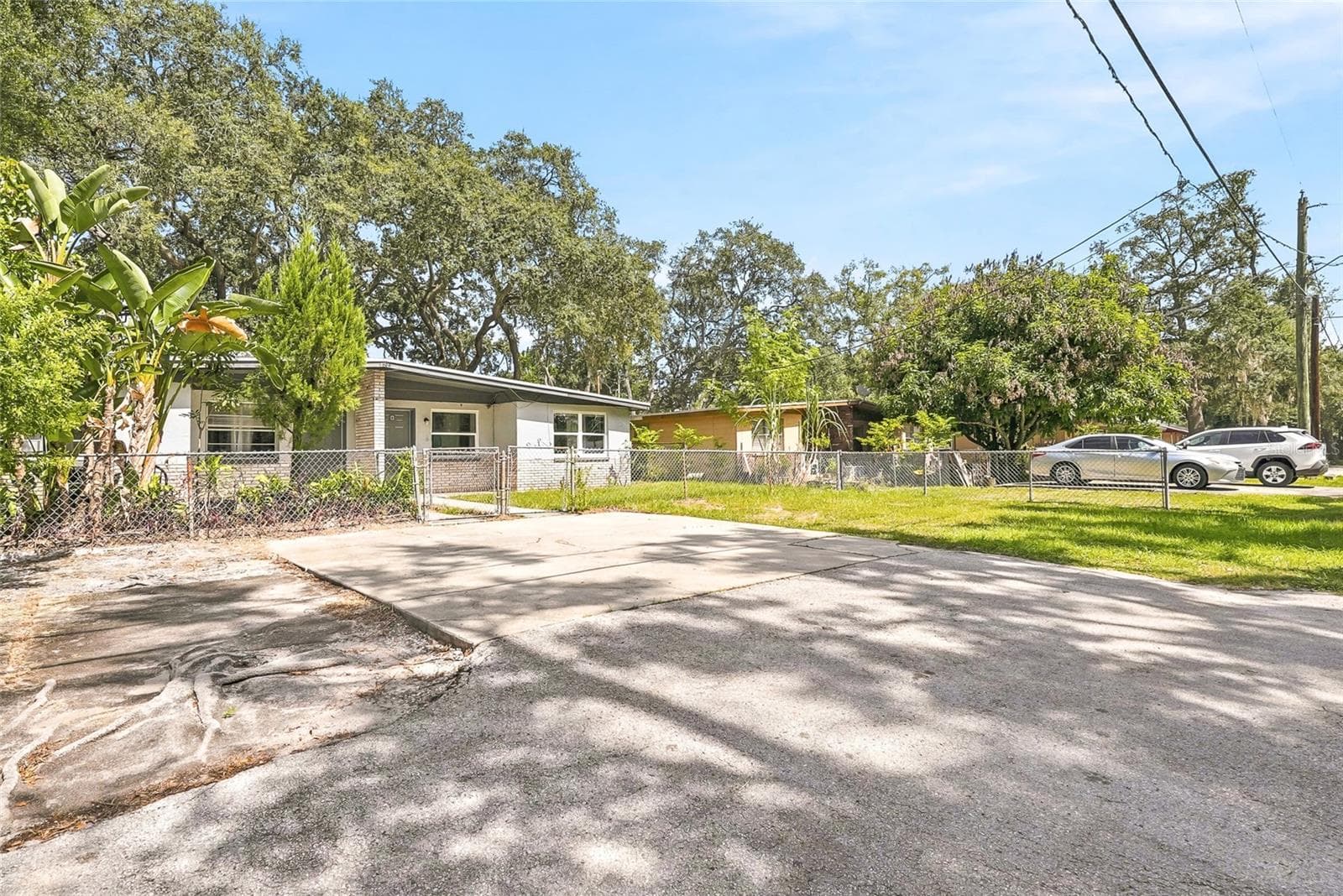 Duplex at 1408 E 140TH AVE, TAMPA, photo 2 of 55