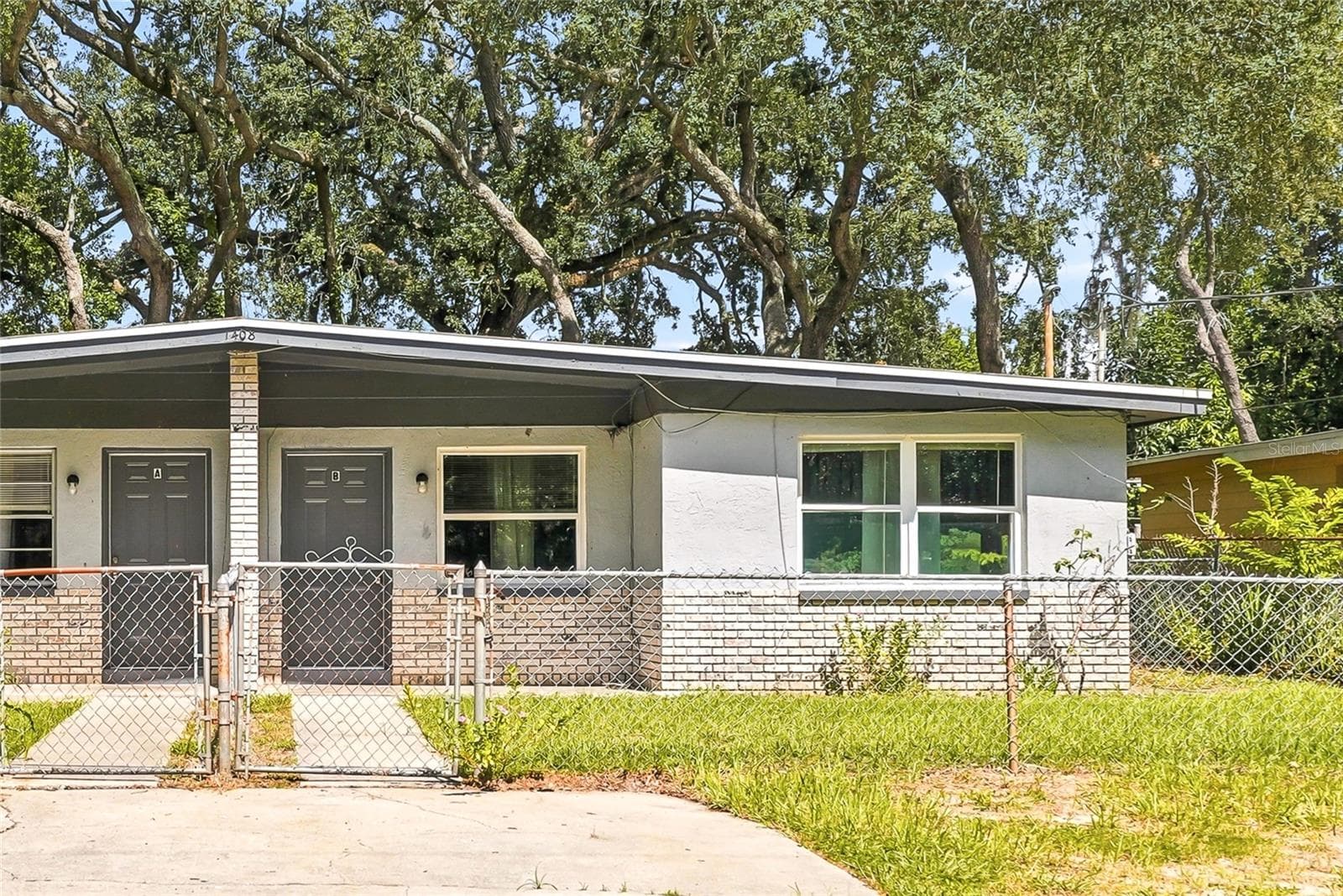 Duplex at 1408 E 140TH AVE, TAMPA, photo 25 of 55