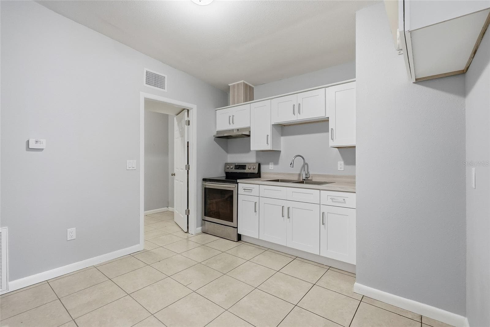 Duplex at 1408 E 140TH AVE, TAMPA, photo 33 of 55
