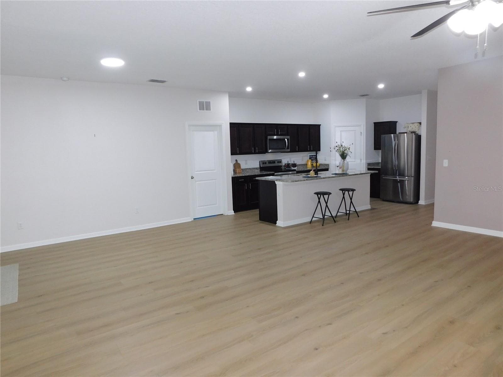 Designer LVP 9X60 throughout living areas ready to greet you! - 1261 ANCHOR BEND DR, RUSKIN