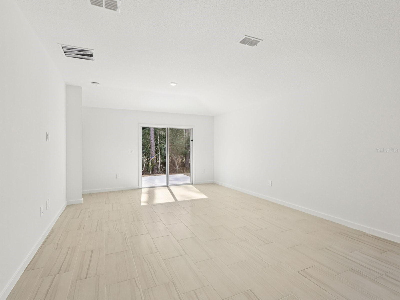 Photo is not of the actual home, but is an inspirational photo of builder’s model home and may depict options, furnishings, and/or decorator features that are not included - 124 WANDERING CREEK WAY, PALM COAST