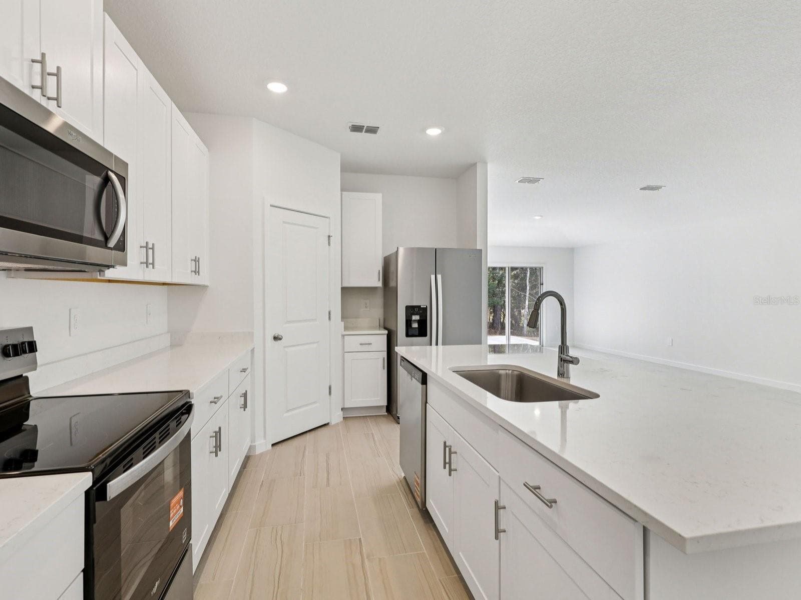 Photo is not of the actual home, but is an inspirational photo of builder’s model home and may depict options, furnishings, and/or decorator features that are not included - 124 WANDERING CREEK WAY, PALM COAST