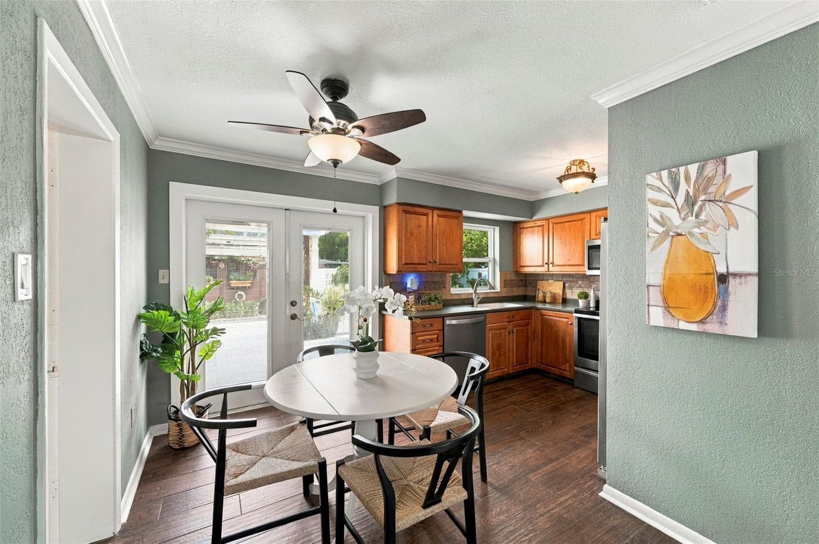 French doors lead form the Dining Room to the back yard. - 620 PALM PL, SAFETY HARBOR