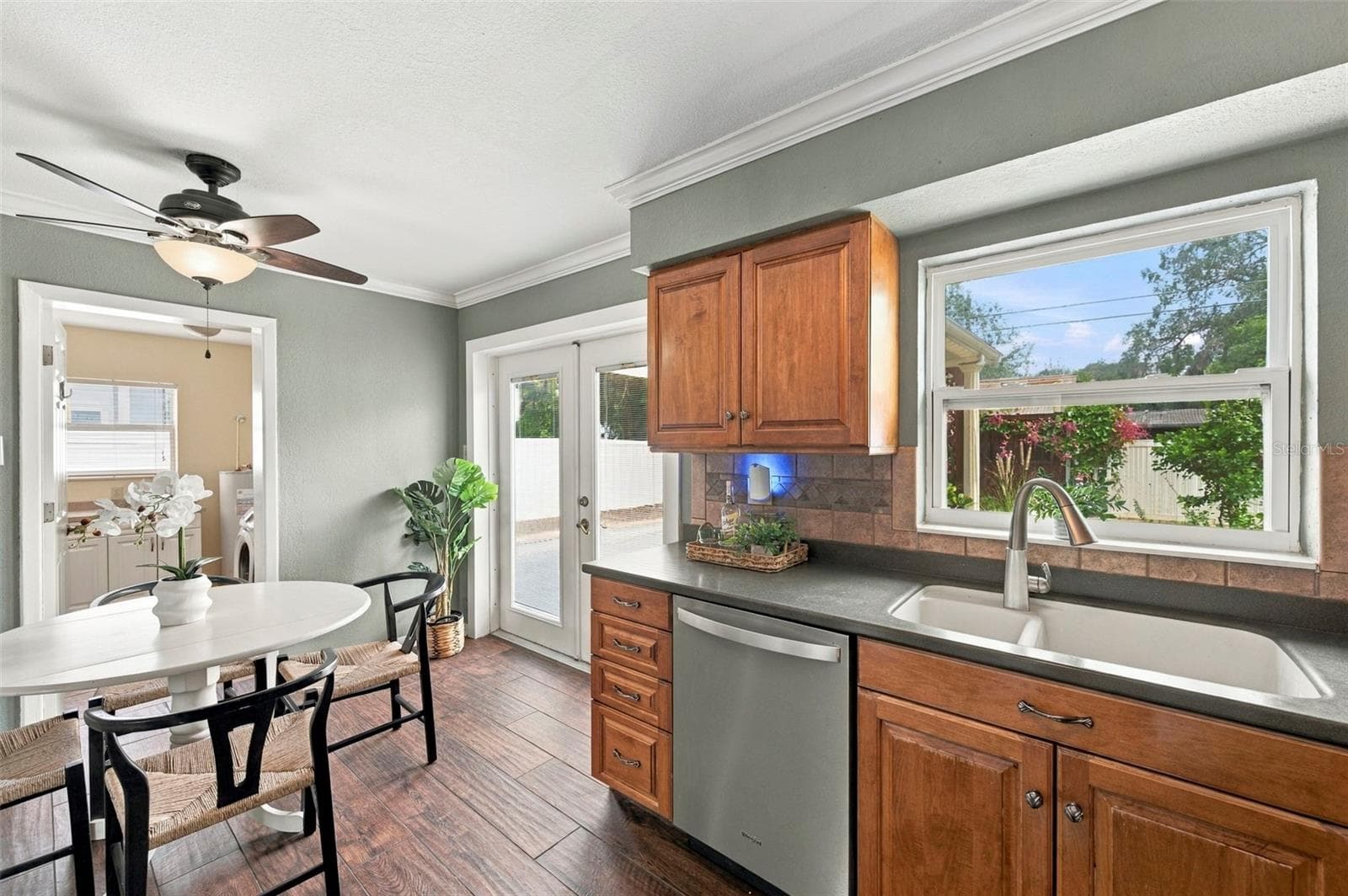 Great view of the backyard from the kitchen window - 620 PALM PL, SAFETY HARBOR