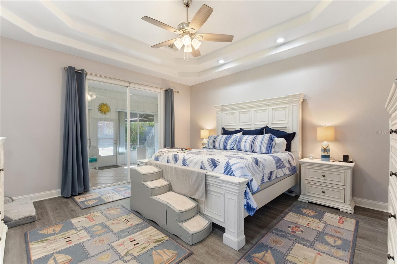 Primary bedroom with sliding doors to the Lani - 1039 MOTORCOACH DR. DR, POLK CITY