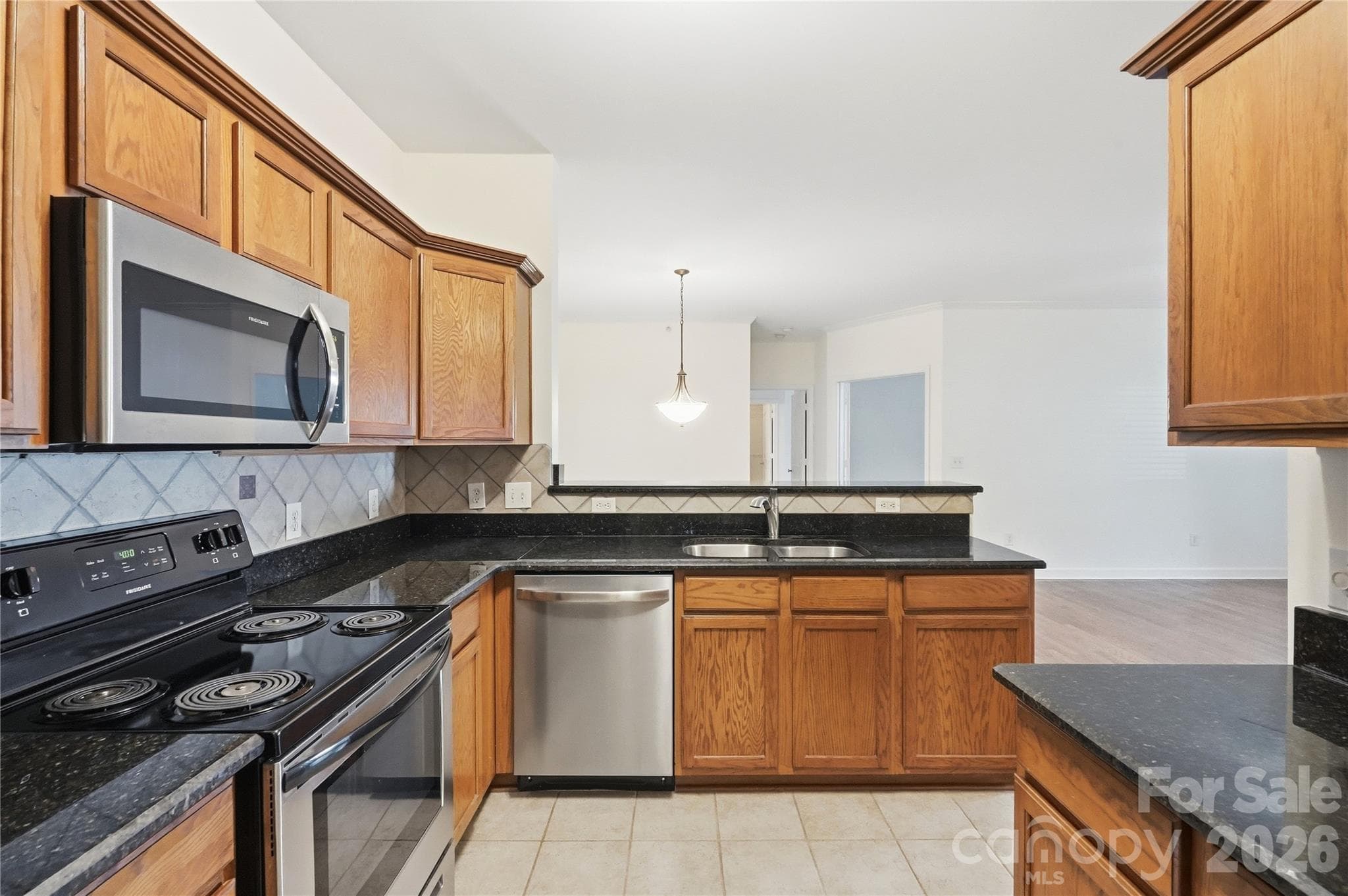 full kitchen with stainless appliances - 16406 Redstone Mountain Lane, Charlotte