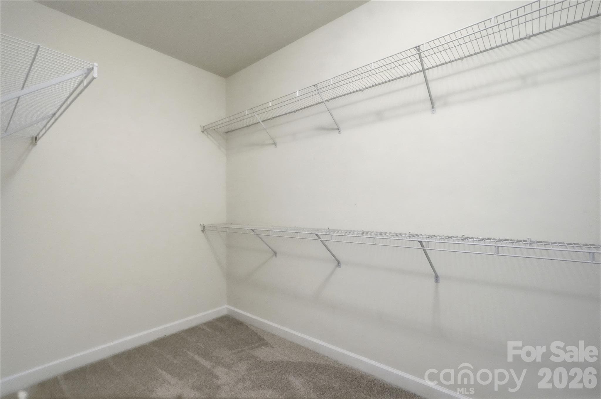large walk-in closet - 16406 Redstone Mountain Lane, Charlotte