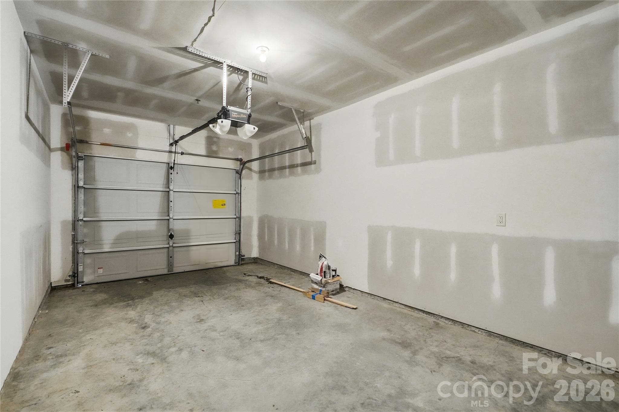 one car garage attached to the building (#98) for entrance and exit without leaving the building - 16406 Redstone Mountain Lane, Charlotte
