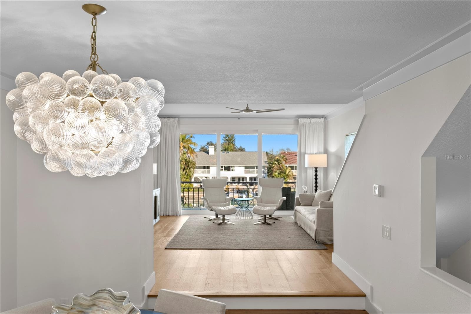 Living room from dining area - 1067 PINELLAS BAYWAY S, ST PETERSBURG
