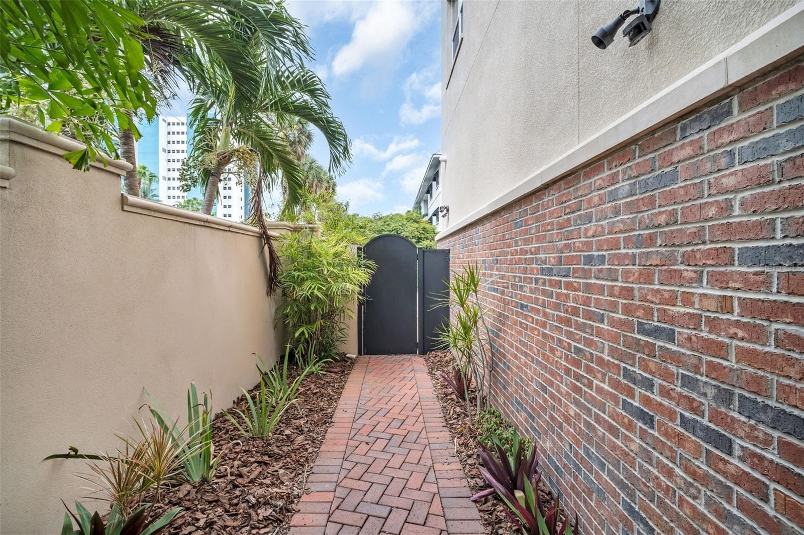 side secure gate by garage entry - 500 BEACH DR NE, ST PETERSBURG
