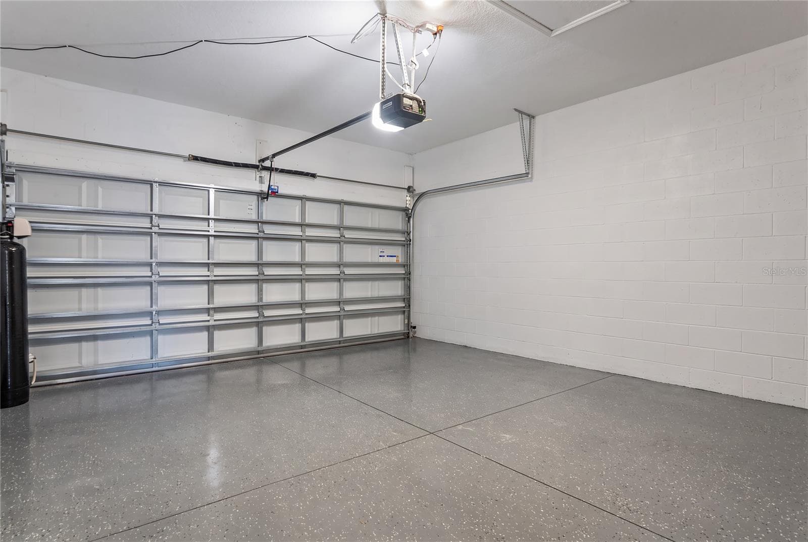View of Garage from inside home - 8580 BOLD CYPRESS LN, WESLEY CHAPEL