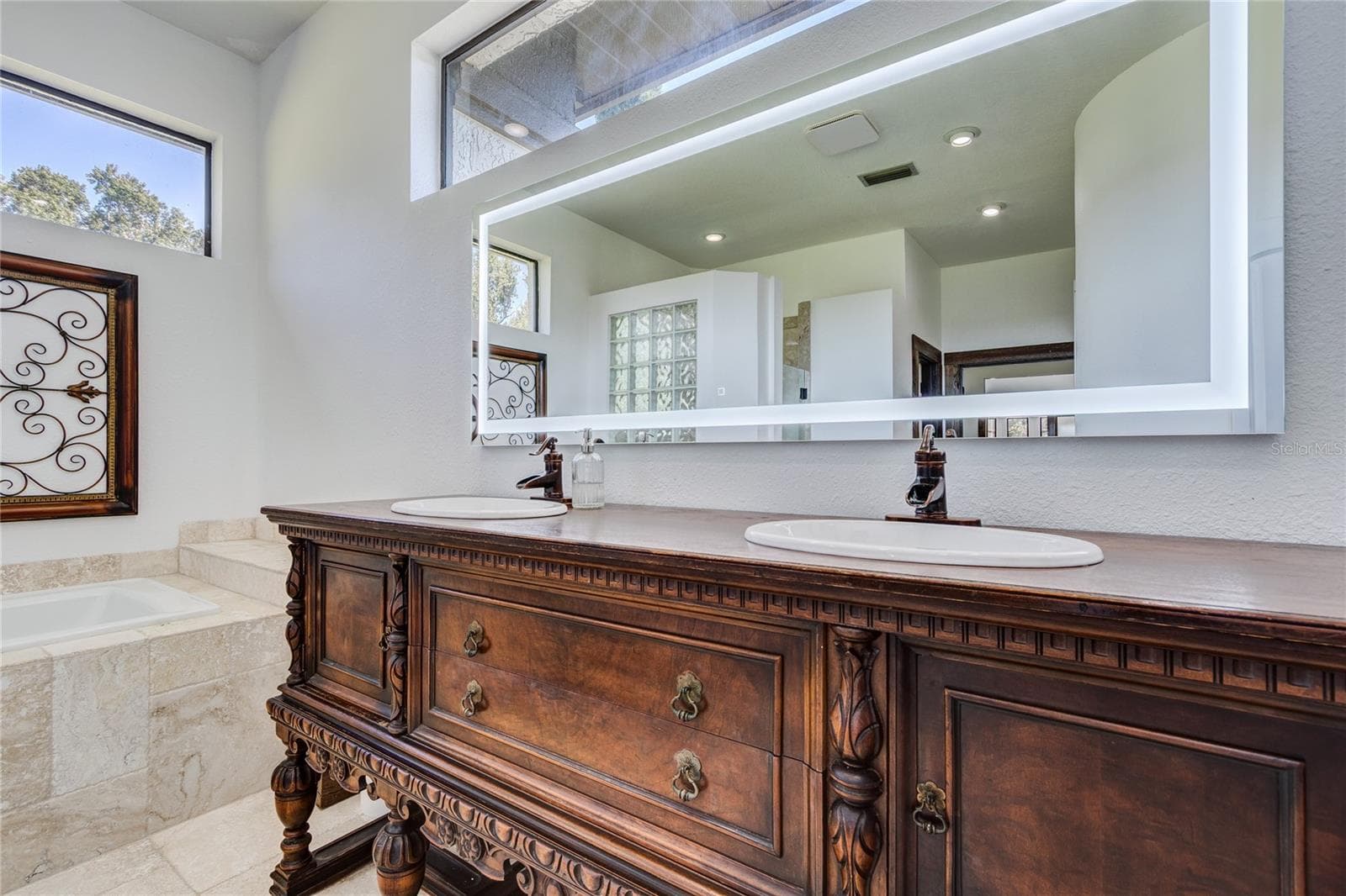 LED Mirror over antique wood vanity! - 32305 PASCO RD, SAN ANTONIO