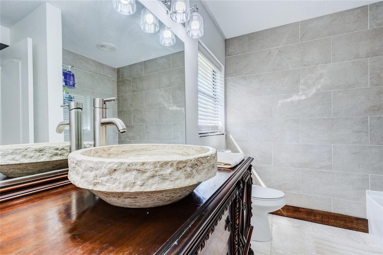 Travertine sink and antique wood vanity! - 32305 PASCO RD, SAN ANTONIO